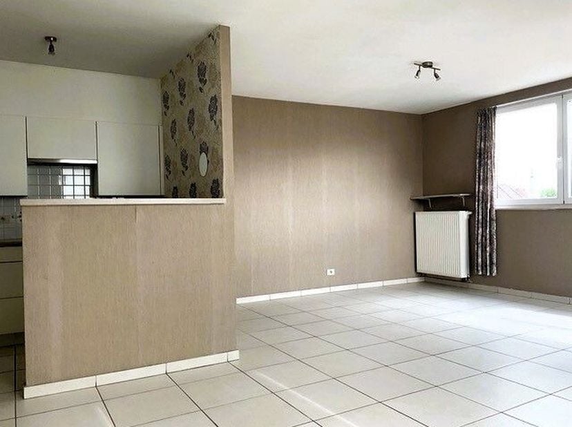 Prachtig modern appartement op het 2de verdiep van een kleinschalige residentie te Kuurne, omvattende o.a. op het GELIJKVLOERS: Inkomhal Gastentoilet